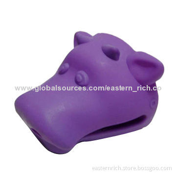 Silicone grabber, cattle shaped, measures 12x10.5x9.5cm